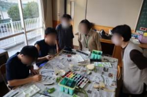 見守られながら